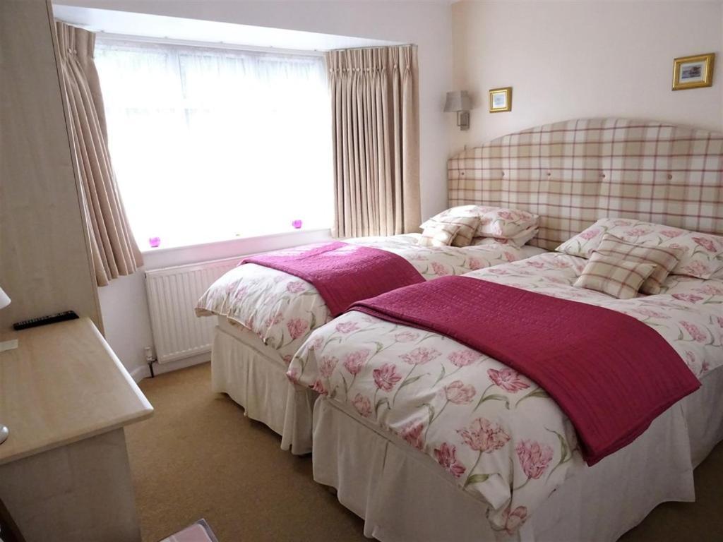 Honey Lodge Broadstone Quarto foto